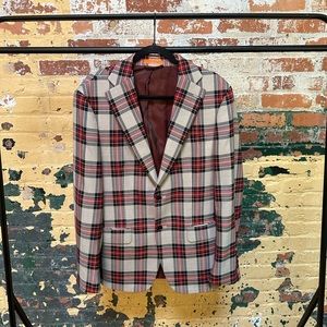 Plaid suit jacket. Was given as a gift but never worn. Not sure the exact size.